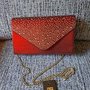 Elegant Red Clutch with Gold Chain